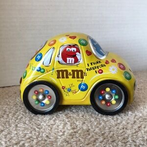 Vintage M&M tin “Beetle” style car